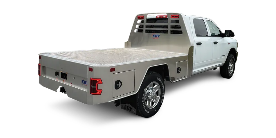 EBY Free Country aluminum flatbed towing body on a truck